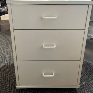 Side drawer with wheels.